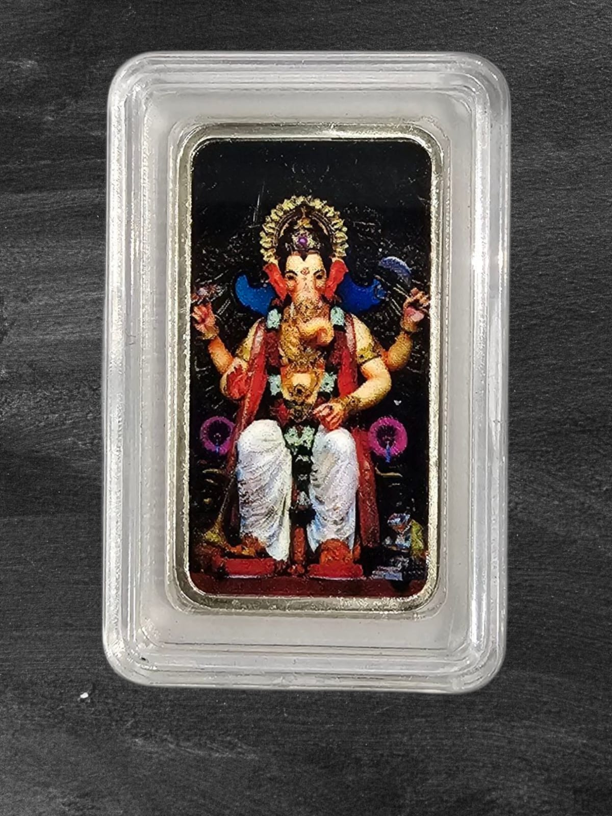 Divine Blessings in Pure Silver – 10g Ganpati Bappa Coin, Elegantly Encased in Secure Capsule Packaging.